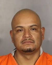 Man charged in 2 sex assaults of woman