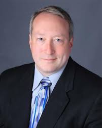 Dr. George Elliott, M.D.