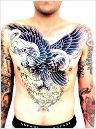 35 Attention Grabbing Eagle Tattoo Designs Tattoos Tattoos For Guys Chest Tattoo
