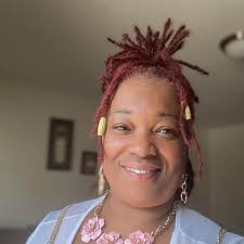 I stuffed a glass canister with chocolate candy as a vase to the Bouquet.