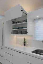 Custom Electric Lift Up Cabinets Just A Touch Of The Cabinet Door Opens Closes Automatically Kitchen Cabinets Uk Buy Kitchen Cabinets White Modern Kitchen
