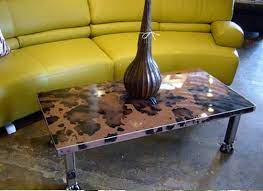 This beautiful table with an industrial look was made from a recycled car hood! Creative Coffee Tables Made Of Car Hood Clunkers Hometone Home Automation And Smart Home Guide