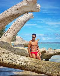 Elliot page has shared a photo of himself by a pool with the caption trans bb's first swim trunks following top surgery. Yxwvcro2jx7axm