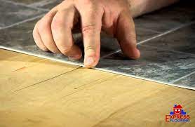 If there are any dents, dings, or deep scratches, repair them with a trowel before installation. The Ultimate Guide How To Install Vinyl Tiles Over A Wood Floor