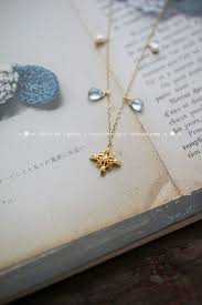 七月微风 agete风 精致镂空仿珍珠花片 托帕石14k注金项链 淘宝网 jewelry arrow necklace necklace