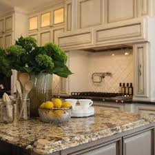 Santa cecilia 12x12 polished granite from brazil has gold and yellow undertones with gray and dark brown veins. Beveled Granite Countertops Design Ideas