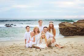 Happy mother and smiling father with two children, son and daughter, having fun during summer holiday. Ways To Mix Cream And White For Your Own Timeless Family Portrait Kristin Rachelle