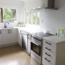I've been such a huge fan of the classic all white kitchen for many years now. Grey Kitchen Black Handles