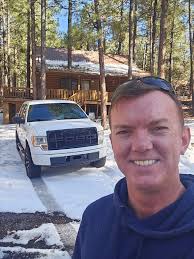 First snow of the season....nice. Happy dog !!