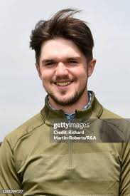 Harvey Byers of Walton Heath tees off