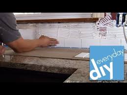 Learn how to make a diy tile backsplash that will give your kitchen an instant makeover. How To Install A Tile Backsplash Part 1 Buildipedia Diy Youtube