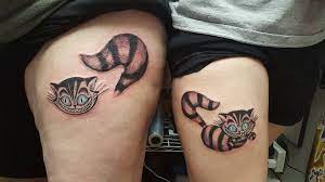 Mother Daughter Cheshire Cat Tattoos Alice In Wonderland Witch Tattoo Ideas Tattoo Ideas Mother Daughter Tattoos