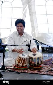 Playing tabla drums hi-res stock ...