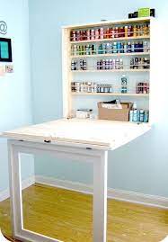 775 x 960 jpeg 86 кб. Fold Down Table With Wall Mounted Storage Craft Paint Storage Craft Table Home Diy
