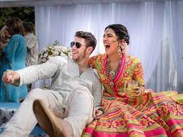 Priyanka chopra's iconic red wedding lehenga was added in the 2019 spring summer sabyasachi collection titled 'namaste easy'. Photos Priyanka Chopra In Ralph Lauren Wedding Dress With Nick Jonas