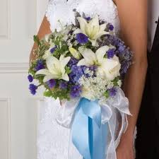 Whether you're staying close to home or traveling, this is a great way to integrate some of the local landscape into your wedding. Blue Bridal Bouquet Ideas Flower Bouquet Wedding Wedding Flower Guide Blue Wedding Bouquet