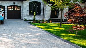 Exposed aggregate driveway vs concrete. How Much Do Concrete Driveways Cost In Ontario Markstone Landscaping