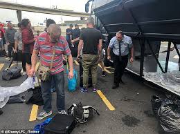 Тело промокшее в их моче, в. Leaking Bus Toilet Leaves Liverpool Fans With Urine Soaked Luggage Daily Mail Online