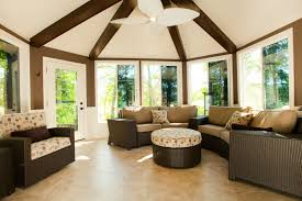 The front side is flanked with floor to ceiling windows, revealing the view outside, while inside, you will notice that it uses the same stone flooring material as the outside area. Smart Idea 4 Season Room Decorating Ideas