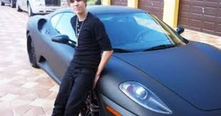 Justin bieber's 2011 ferrari 458 italia fetched 395k at the barrett jackson auction. Justin Bieber And His Ferrari F430 Justin Bieber Ferrari Celebrity Cars Justin Bieber Posters
