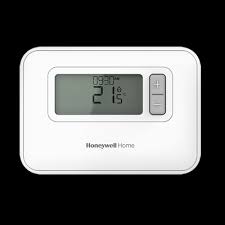Gently pull at the bottom of the thermostat to remove it from the wall plate. T3 Heating En