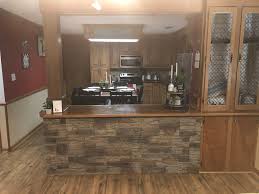 Your island can be a beautiful centerpiece for your kitchen and really cat the attention of family and guests. Darren S Stone Veneer Kitchen Island Genstone