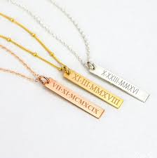 Maybe you would like to learn more about one of these? Engraved Vertical Bar Pendant Necklace Danique Jewelry