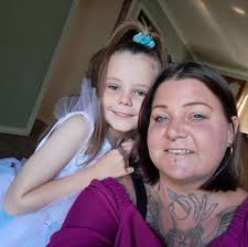 Why do spider plant leaves turn reddish brown