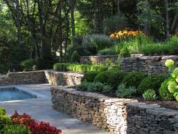 25 Wonderful Examples Of Terraced Front Yard Gardens Tiered Landscape Terraced Landscaping Traditional Landscape