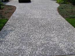 Shell oysters installation on concrete driveway. Oyster Shell Aggregate Materialdistrict