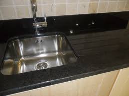 Curve the sharp interior corners by about two degrees with the power router, to prevent. Indian Black Worktop With Sink Cut Out Flutes Wells Granite Marble Ltd