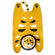 Babies spend a lot of time on the floor, whether they're playing, crawling or learning to walk. Felt Tiger Rug For Kids Room Or Nursery By Fiona Walker