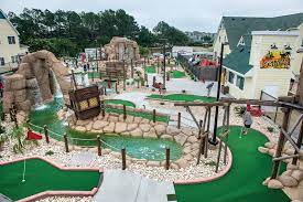 Ten of the holes are played on a separate island. Pirates Island At Corolla Light Town Center Outerbanks Com