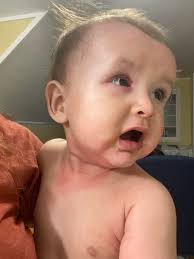 Older pic from a few months back but my sons first bull red! He was scared  to hold it unfortunately!