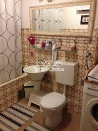 How Do I Make These Burnt Orange Bathroom Tiles Work