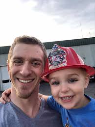 Borough employee Dalton helps at the park