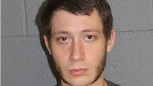 Tyrone man charged after altercation with police involving rifle