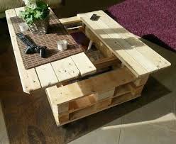 Tie it all together by decorating the round table top with a tray to place books, a vase, or artistic pieces on. Multifunctional Coffee Table With Storage Made From Used Pallets