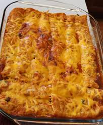 In a 9x13 pan spread a thin layer of sauce on. Beef Enchilada Ground Beef Enchiladas Beef Enchiladas Recipes