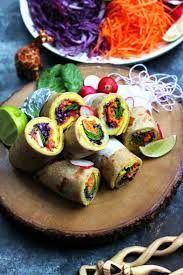 Ugandan Rolex East African Breakfast Wraps Rolled With A Vegan Omelette Inside Vegan African Recipes Vegan Omelette African Food