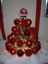 Took My 35 Cupcake Stand From Costco And Strung White Christmas Lights In It Then Put Plastic Hol White Christmas Lights Christmas Bulbs Christmas Wreaths