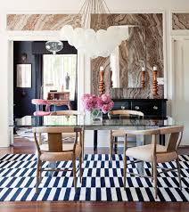 Amazing dining room decoration with tom dixon copper shades over pedestal dining table surrounded by gray barrel back dining chairs with antique brass base by kelly wearstler. Kwdr26 Kelly Wearstler Dining Room Today