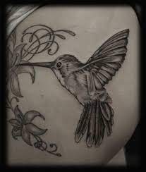 Black And Grey Hummingbird Tattoo Design Black Tattoos Hummingbird Tattoo Bird And Flower Tattoo