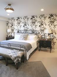 Try slate grey channel tufted walls and silk bedding for a softer take on the classic black and white. Black And White Wallpaper Accent Wall