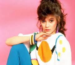 Teens in the 1980s often paired leggings with bold, curly hair for a complete style. 18 Cringeworthy Fashion Accessories From The 80s Cafemom Com