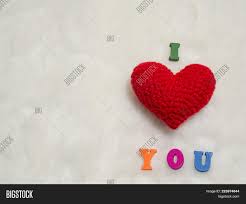 Company alphabet letter u logo design with red love heart symbol. Red Yarn Heart On Image Photo Free Trial Bigstock