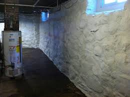 It's time to take down the fieldstone wall that was out of plumb/leaning. Stone Foundation Repair Basement Waterproofing Massachusetts