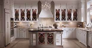 Glass cabinet door add character to a classic white kitchen. Tinted Glass Doors On The Kitchen Cabinets Kitchen Cabinet Layout Kitchen Design Kitchen Inspirations