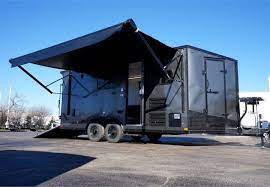 18 Toy Hauler With Upgraded Kitchen This Outstanding Toy Hauler Features Two Wall Mount Fold Toy Hauler Travel Trailer Toy Hauler Camper Toy Hauler Trailers