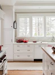 Custom modern kitchen with red walls, white cabinets. White Kitchen With Red Accents Transitional Kitchen White Kitchen Red Accents Red Kitchen Decor Red And White Kitchen